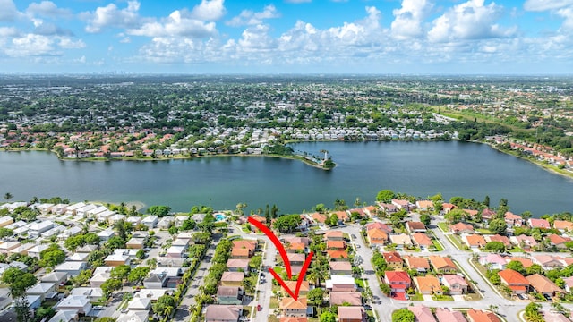 3385 Seabreeze Ln, Margate, FL 33063 - aerial perspective of suburban area with a large body of water
