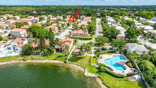 3385 Seabreeze Ln, Margate, FL 33063 - aerial view of residential area with a pool area and a large body of water