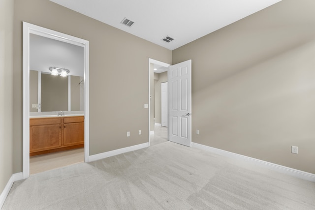 2854 Bellarosa Cir, Royal Palm Beach, FL 33411 - unfurnished bedroom with light colored carpet and ensuite bath