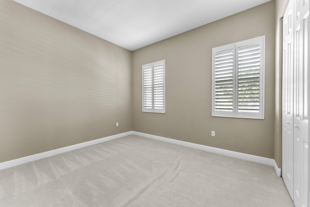 2854 Bellarosa Cir, Royal Palm Beach, FL 33411 - spare room with light colored carpet and baseboards