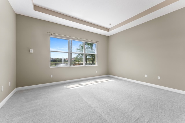 2854 Bellarosa Cir, Royal Palm Beach, FL 33411 - empty room with carpet flooring and a raised ceiling