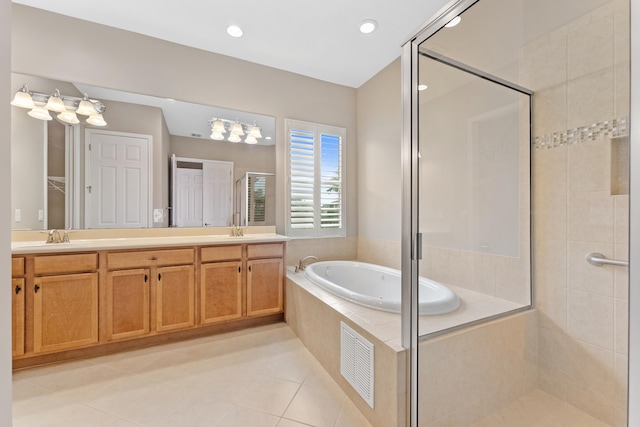 2854 Bellarosa Cir, Royal Palm Beach, FL 33411 - bathroom featuring a shower stall, a garden tub, double vanity, tile patterned flooring, and recessed lighting