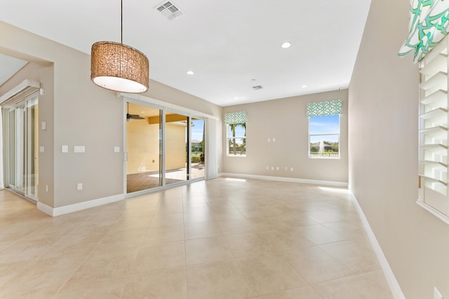 2854 Bellarosa Cir, Royal Palm Beach, FL 33411 - unfurnished room featuring light tile patterned floors and recessed lighting