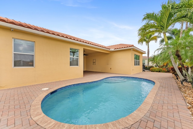 2854 Bellarosa Cir, Royal Palm Beach, FL 33411 - outdoor pool with a patio area