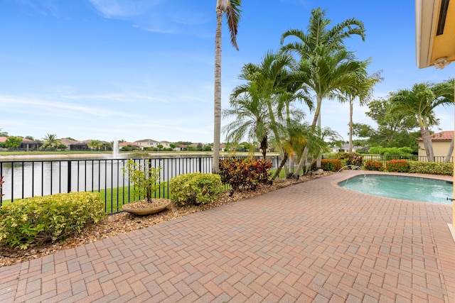 2854 Bellarosa Cir, Royal Palm Beach, FL 33411 - view of swimming pool with a water view and a patio area