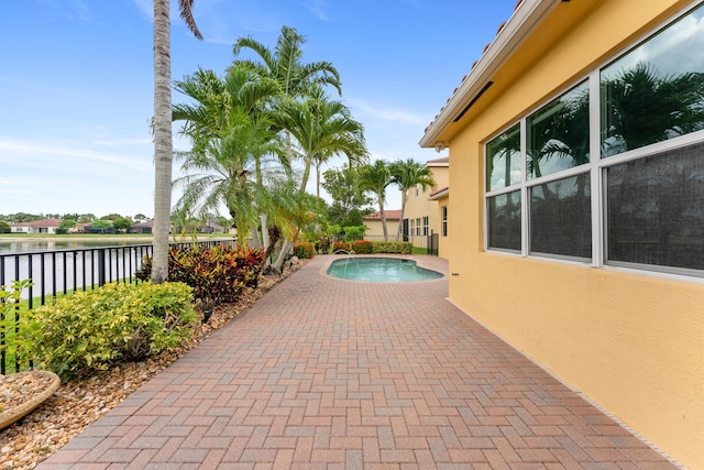 2854 Bellarosa Cir, Royal Palm Beach, FL 33411 - view of pool with a water view and a patio