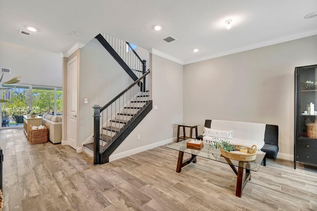 4610 SW Ardsley Dr, Stuart, FL 34997 - living area featuring stairs, ornamental molding, light wood-style flooring, and recessed lighting
