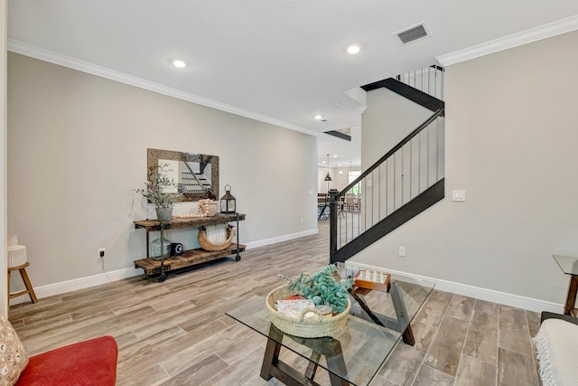 4610 SW Ardsley Dr, Stuart, FL 34997 - living area featuring stairway, wood finished floors, crown molding, and recessed lighting