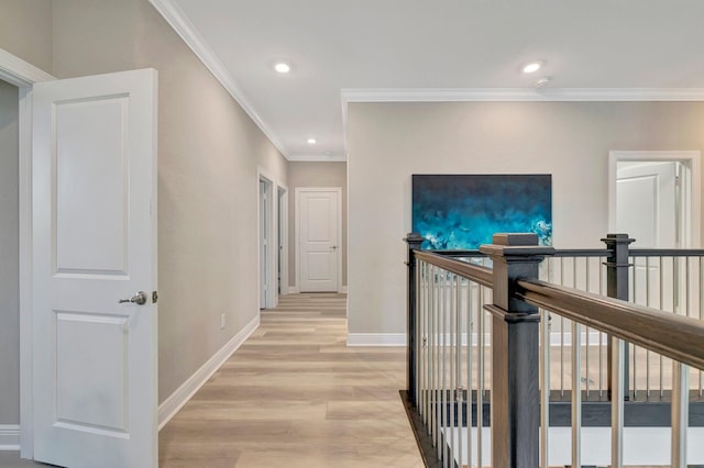4610 SW Ardsley Dr, Stuart, FL 34997 - corridor with crown molding, light wood-style flooring, recessed lighting, and an upstairs landing