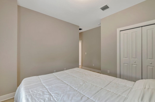 4610 SW Ardsley Dr, Stuart, FL 34997 - bedroom featuring baseboards and a closet