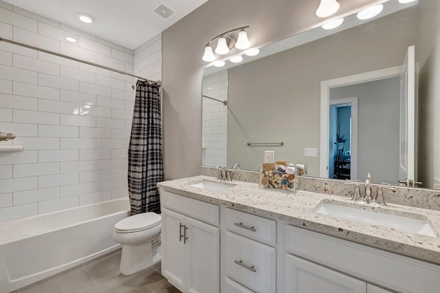 4610 SW Ardsley Dr, Stuart, FL 34997 - bathroom featuring double vanity, shower / bath combo, and tile patterned floors
