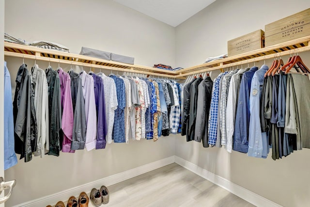 4610 SW Ardsley Dr, Stuart, FL 34997 - walk in closet with wood finished floors