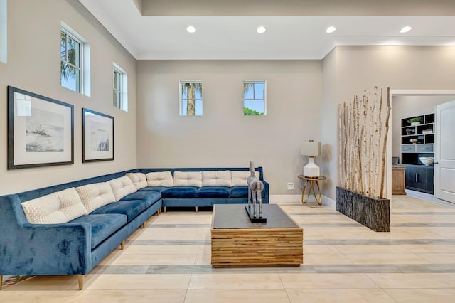 4610 SW Ardsley Dr, Stuart, FL 34997 - living room with recessed lighting, ornamental molding, plenty of natural light, and light tile patterned flooring