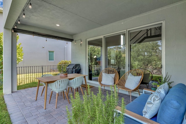 4610 SW Ardsley Dr, Stuart, FL 34997 - view of patio / terrace with a grill and outdoor dining space