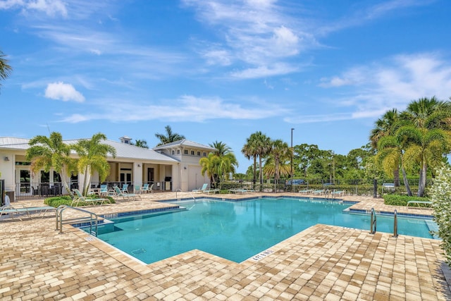 4610 SW Ardsley Dr, Stuart, FL 34997 - community pool featuring a patio