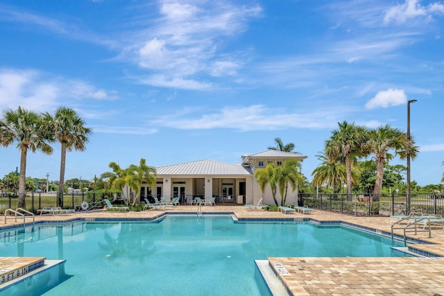 4610 SW Ardsley Dr, Stuart, FL 34997 - community pool with a patio area