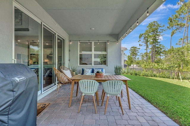 4610 SW Ardsley Dr, Stuart, FL 34997 - view of patio featuring grilling area and outdoor dining area