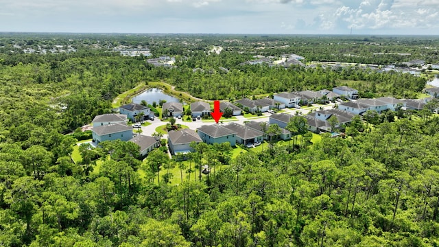 4610 SW Ardsley Dr, Stuart, FL 34997 - aerial view of residential area with a heavily wooded area