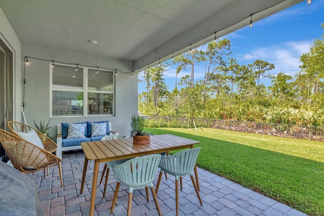 4610 SW Ardsley Dr, Stuart, FL 34997 - fenced backyard with a patio area and outdoor lounge area