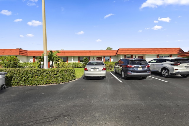 5800 Fernley Dr W Unit 54, West Palm Beach, FL 33415 - view of building exterior with uncovered parking