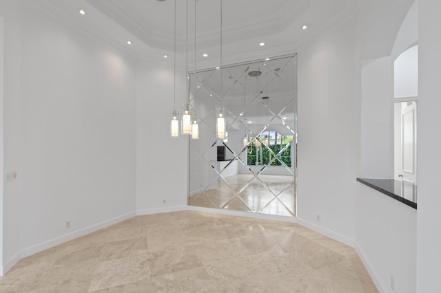 16284 Via Venetia W, Delray Beach, FL 33484 - spare room with a towering ceiling, recessed lighting, crown molding, arched walkways, and a tray ceiling