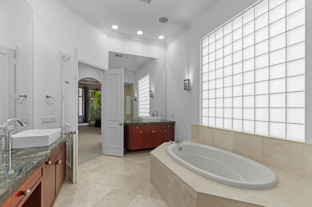 16284 Via Venetia W, Delray Beach, FL 33484 - full bath with ornamental molding, two vanities, a bath, and recessed lighting
