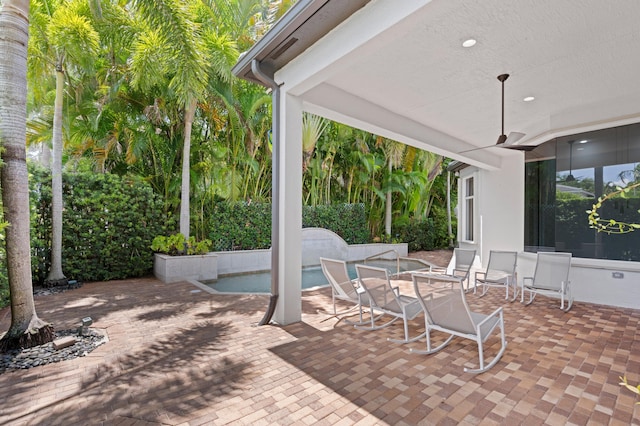 16284 Via Venetia W, Delray Beach, FL 33484 - view of patio with ceiling fan and an outdoor pool