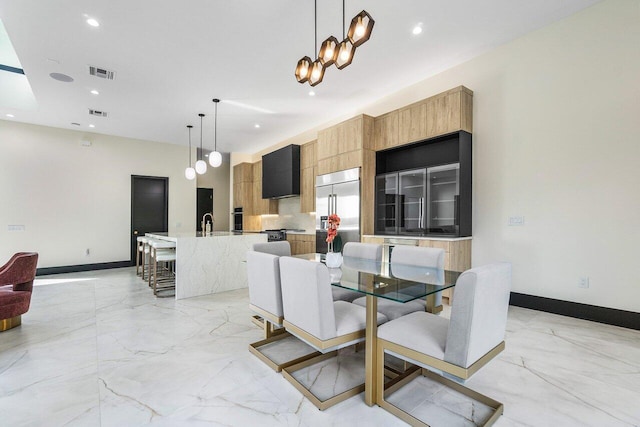 13480 US Highway 1, Juno Beach, FL 33408 - dining area featuring recessed lighting and light marble finish flooring