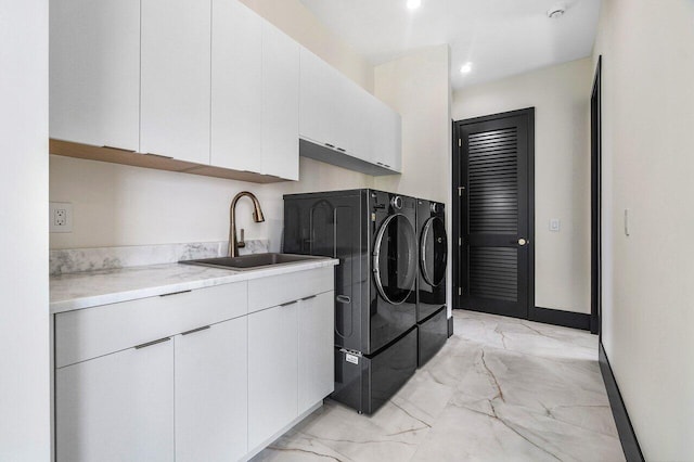 13480 US Highway 1, Juno Beach, FL 33408 - washroom featuring light marble finish flooring, washer and clothes dryer, cabinet space, and recessed lighting