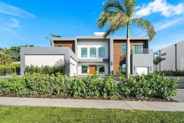 13480 US Highway 1, Juno Beach, FL 33408 - contemporary home with stucco siding and a balcony