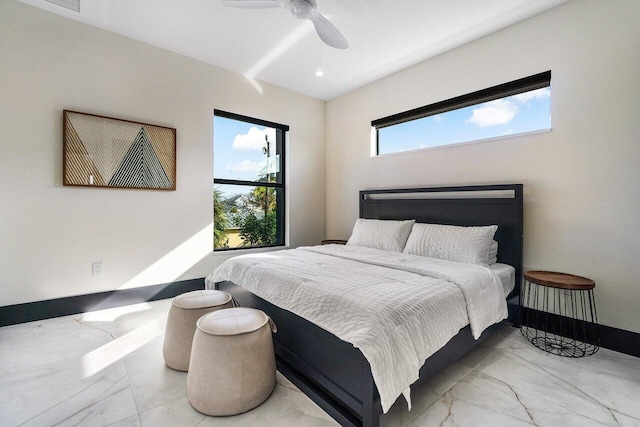 13480 US Highway 1, Juno Beach, FL 33408 - bedroom featuring marble look tile flooring, a ceiling fan, and recessed lighting