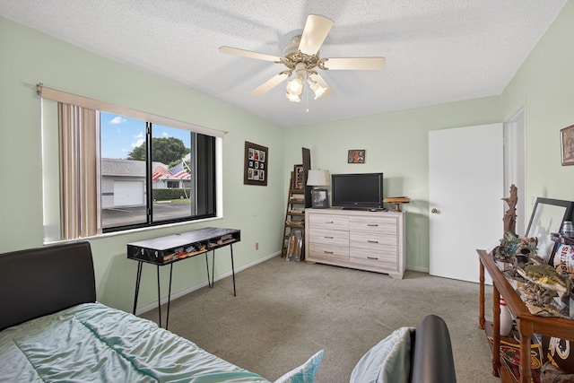 2640 Gately Dr W Unit 1604, West Palm Beach, FL 33415 - carpeted bedroom with a ceiling fan and a textured ceiling