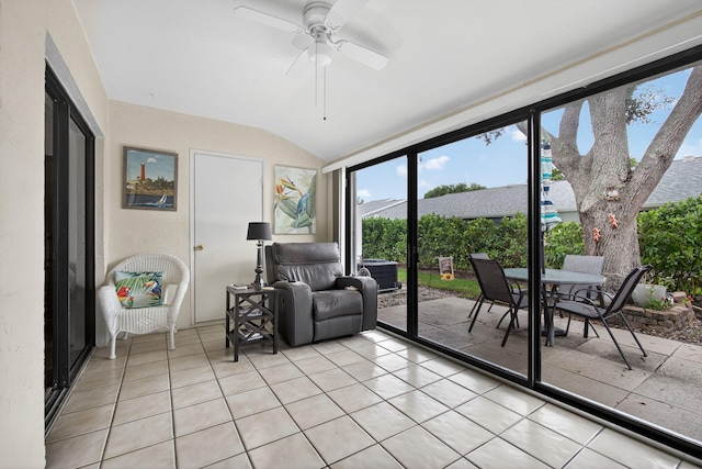 2640 Gately Dr W Unit 1604, West Palm Beach, FL 33415 - sunroom with lofted ceiling, ceiling fan, and outdoor dining space