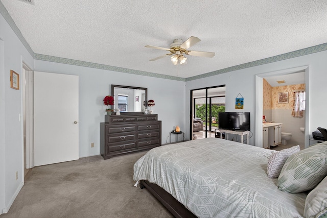 2640 Gately Dr W Unit 1604, West Palm Beach, FL 33415 - bedroom featuring carpet flooring, a textured ceiling, access to exterior, connected bathroom, and ceiling fan