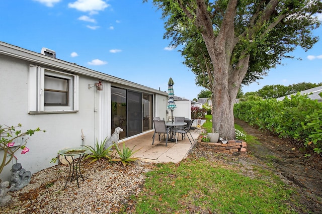 2640 Gately Dr W Unit 1604, West Palm Beach, FL 33415 - view of yard featuring a patio area