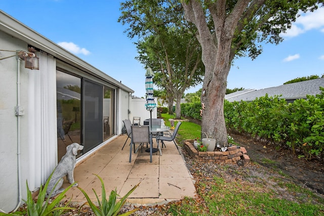 2640 Gately Dr W Unit 1604, West Palm Beach, FL 33415 - view of patio with outdoor dining space