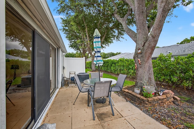 2640 Gately Dr W Unit 1604, West Palm Beach, FL 33415 - view of patio with outdoor dining space