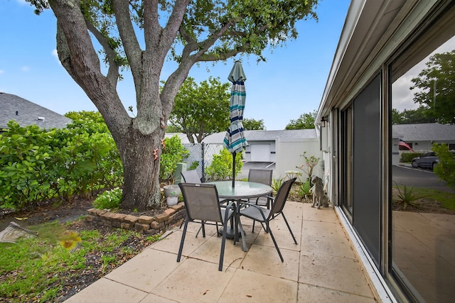 2640 Gately Dr W Unit 1604, West Palm Beach, FL 33415 - view of patio / terrace with outdoor dining space