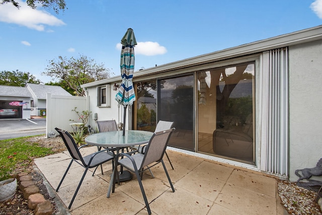 2640 Gately Dr W Unit 1604, West Palm Beach, FL 33415 - view of patio / terrace featuring outdoor dining space
