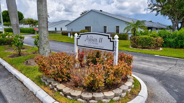 2640 Gately Dr W Unit 1604, West Palm Beach, FL 33415 - community sign with a yard