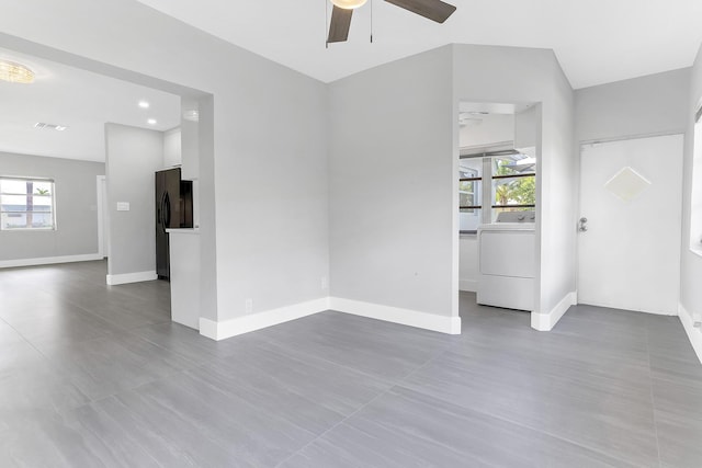 7609 NW 70th Ave, Tamarac, FL 33321 - empty room with washer / dryer, a ceiling fan, healthy amount of natural light, and recessed lighting