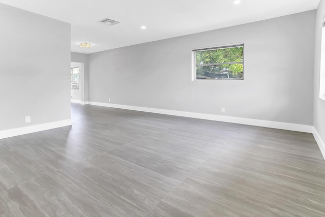 7609 NW 70th Ave, Tamarac, FL 33321 - empty room with recessed lighting