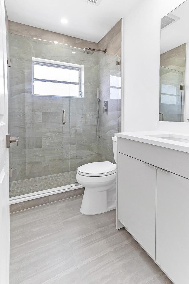 7609 NW 70th Ave, Tamarac, FL 33321 - full bathroom featuring vanity and a stall shower