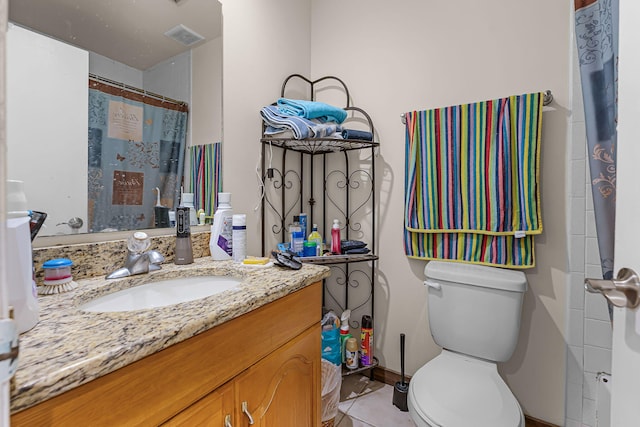 5310 Pebble Beach Dr Unit F, Orlando, FL 32811 - full bath with vanity, tile patterned flooring, and a shower with shower curtain