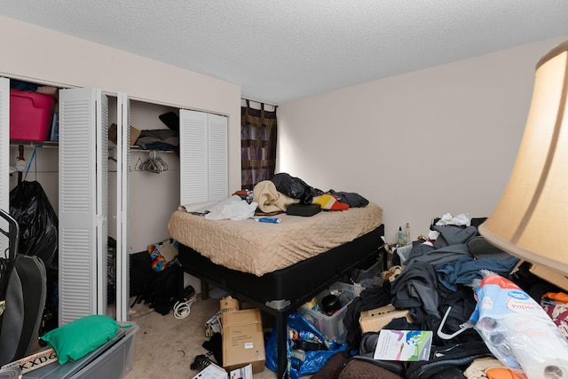 5310 Pebble Beach Dr Unit F, Orlando, FL 32811 - carpeted bedroom featuring two closets