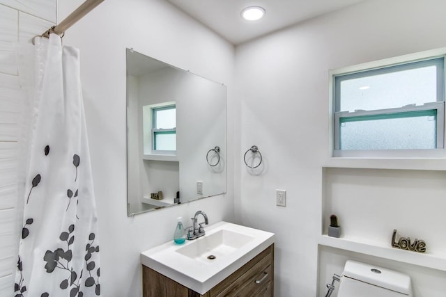 8 Wellesley Dr, Lake Worth Beach, FL 33460 - bathroom with vanity, healthy amount of natural light, and a shower with curtain