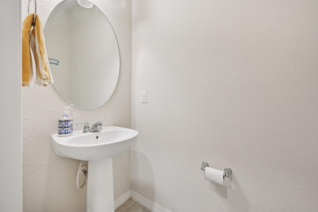 2808 Troubadour St, Palm Springs, FL 33406 - bathroom with a sink and baseboards