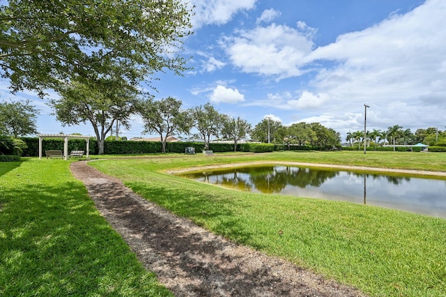 2808 Troubadour St, Palm Springs, FL 33406 - surrounding community featuring a water view, a pergola, and a lawn