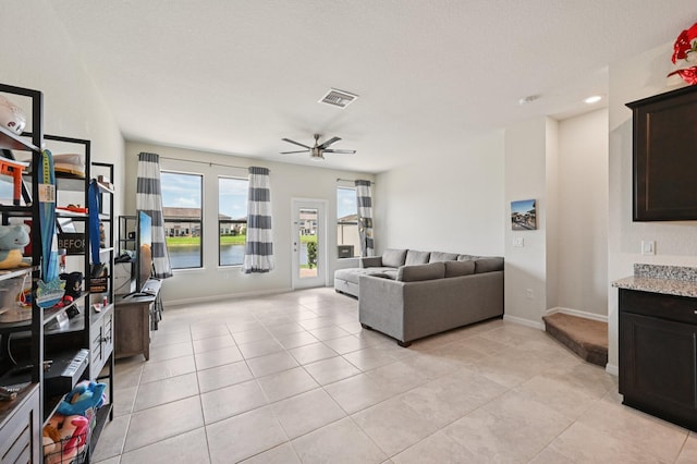 2808 Troubadour St, Palm Springs, FL 33406 - living area featuring a ceiling fan and light tile patterned floors
