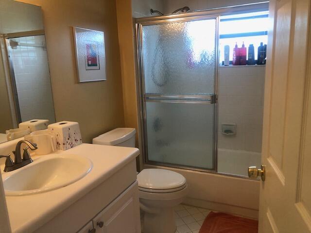 7992 Chula Vista Cres, Boca Raton, FL 33433 - bathroom with vanity, enclosed tub / shower combo, and tile patterned floors